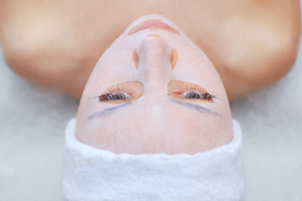 A woman with moisturizing face mask